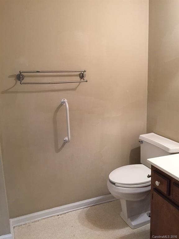 700 Southland Road Huntersville, NC 28078 - Photo 12 of 16 a white toilet sitting next to a shower