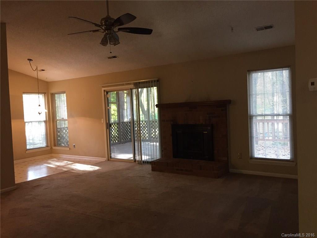 700 Southland Road Huntersville, NC 28078 - Photo 3 of 16 a view of an empty room with a window