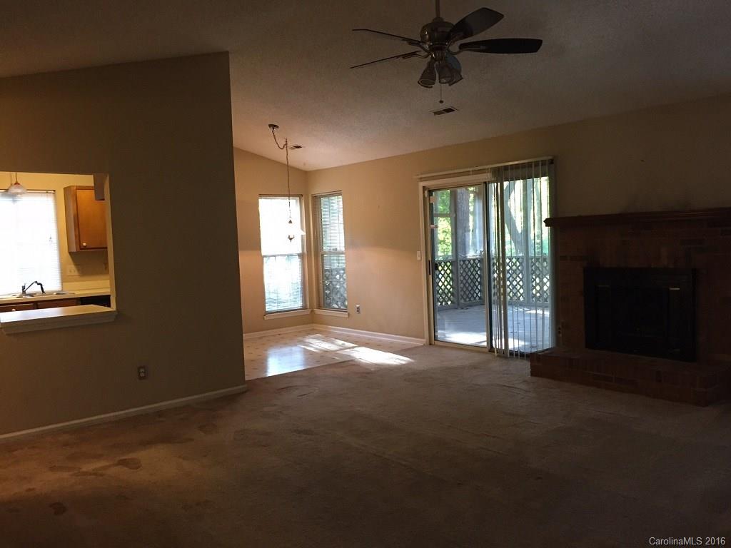 700 Southland Road Huntersville, NC 28078 - Photo 4 of 16 a view of an empty room with a window