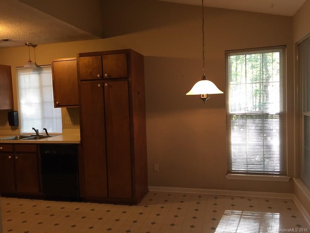 700 Southland Road Huntersville, NC 28078 - Photo 6 of 16 a room with window and cabinet