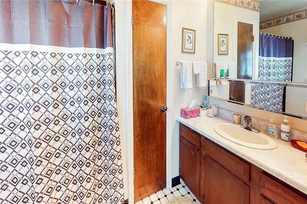 504 North Eighty Eight Road Carmichaels, PA 15320 - Photo 12 of 25 a bathroom with a sink and a mirror