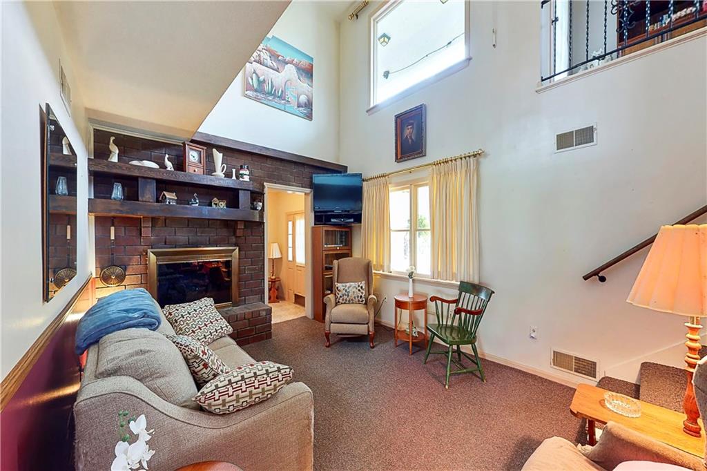 504 North Eighty Eight Road Carmichaels, PA 15320 - Photo 16 of 25 a living room with furniture and a fireplace