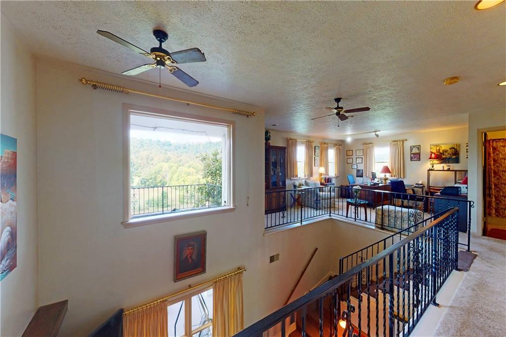 504 North Eighty Eight Road Carmichaels, PA 15320 - Photo 19 of 25 a view of a livingroom with furniture window and wooden floor