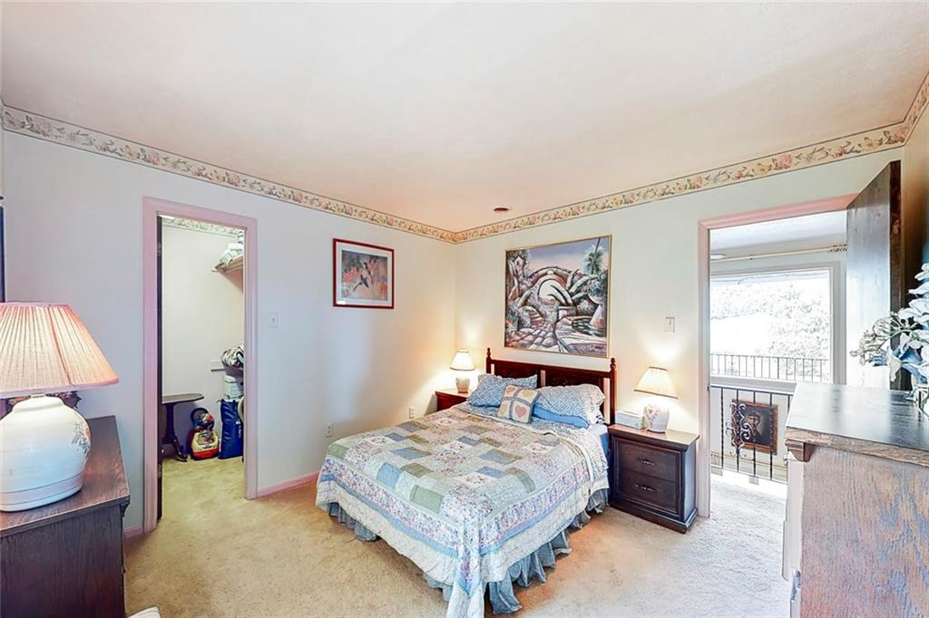 504 North Eighty Eight Road Carmichaels, PA 15320 - Photo 20 of 25 a bedroom with a bed and wooden floor