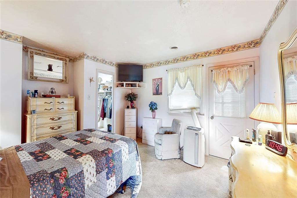 504 North Eighty Eight Road Carmichaels, PA 15320 - Photo 21 of 25 a bedroom with a bed dresser and a window