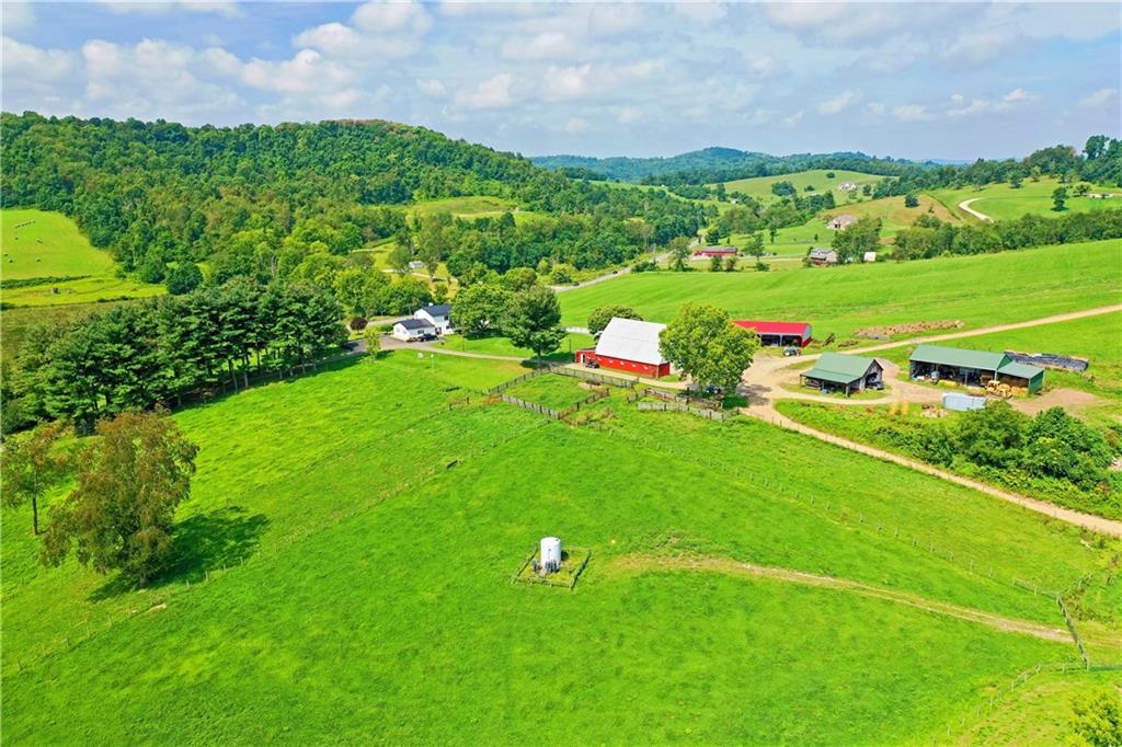 504 North Eighty Eight Road Carmichaels, PA 15320 - Photo 4 of 25 a view of a golf course with a garden