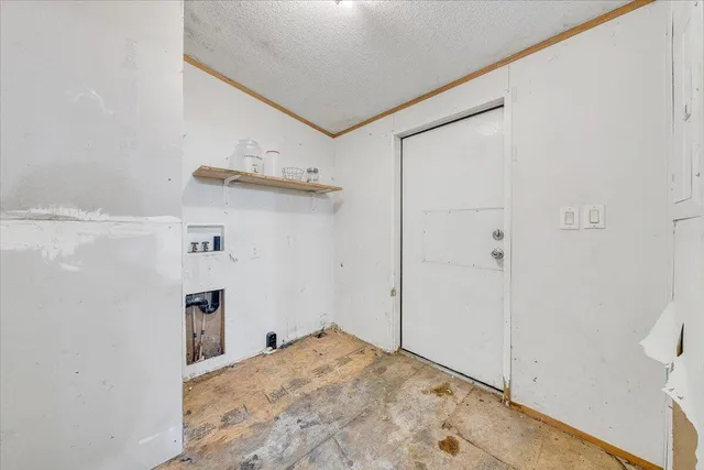a view of empty room with closet