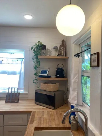 a view of entryway with wooden floor