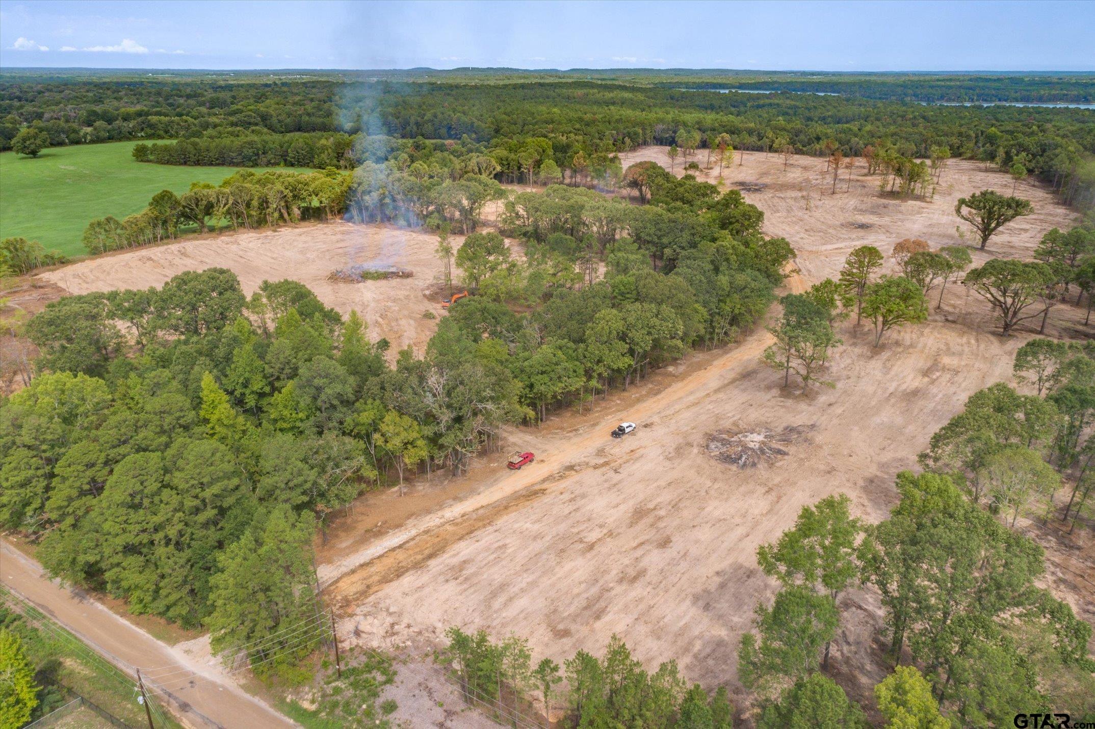 19451 County Road 4307 Larue, TX 75770 - Photo 11 of 22 a view of a lake with beach and city view