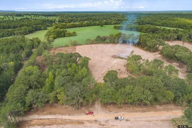 a view of a road with an outdoor space