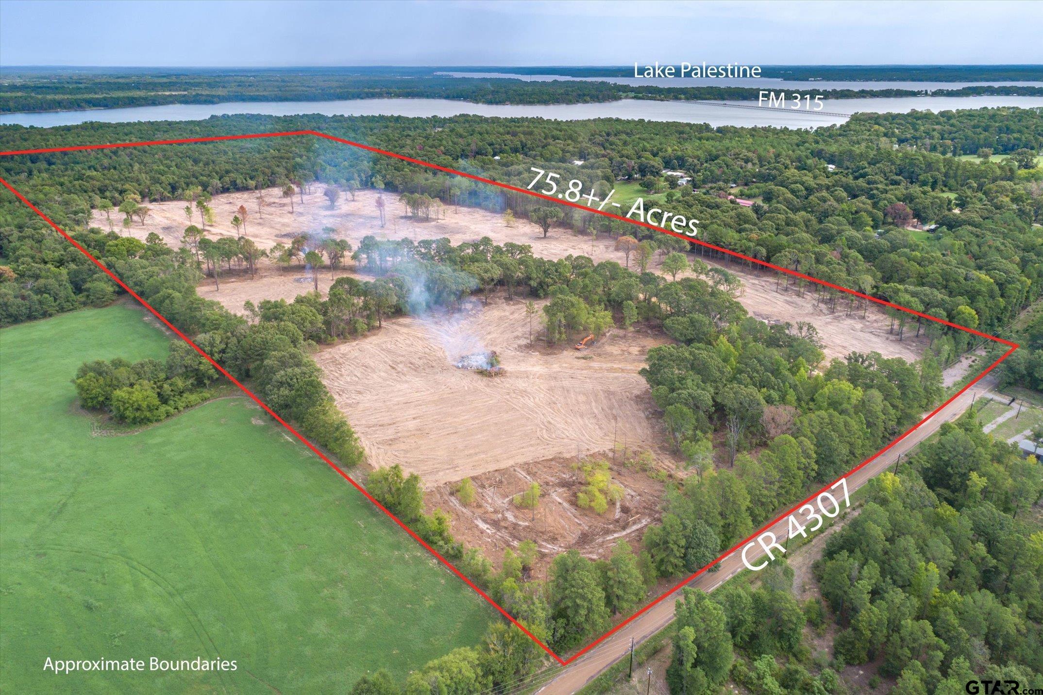 19451 County Road 4307 Larue, TX 75770 - Photo 13 of 22 a view of a lake with a city