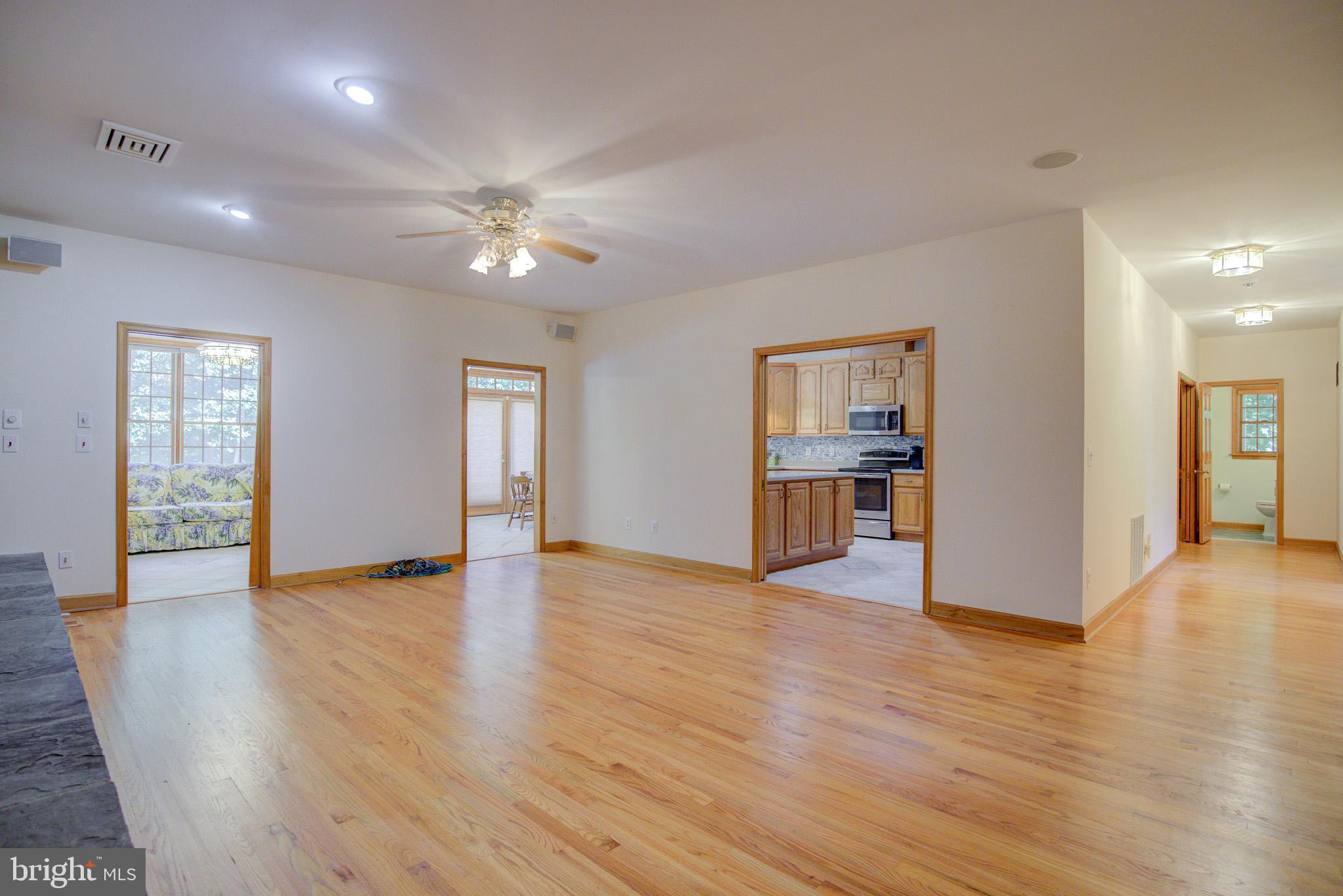 813 Blacks Hill Road Great Falls, VA 22066 - Photo 22 of 92 Large and Open Family Room