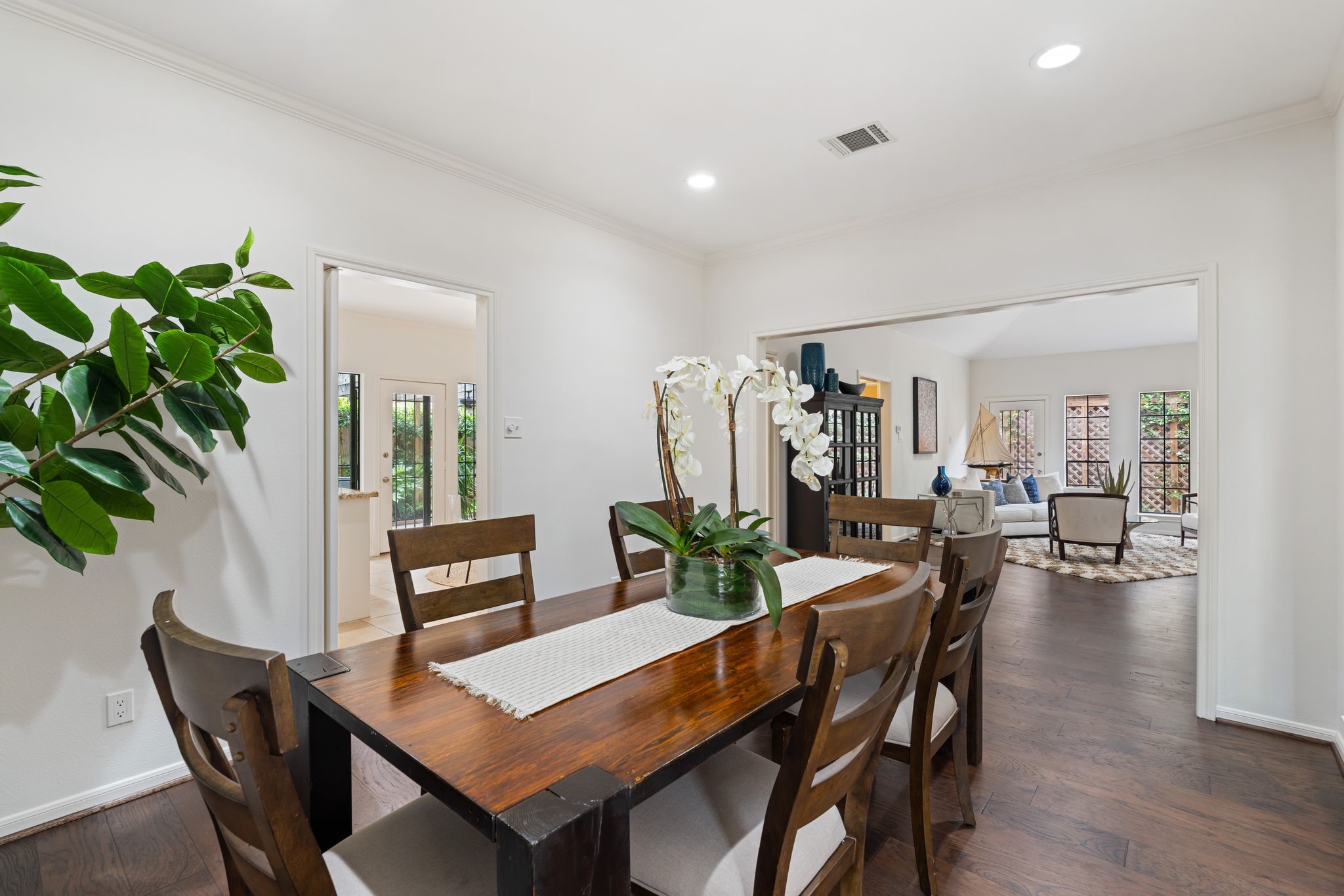 7416 Kelving Street Houston, TX 77030 - Photo 13 of 35 a view of a dining room with furniture and wooden floor