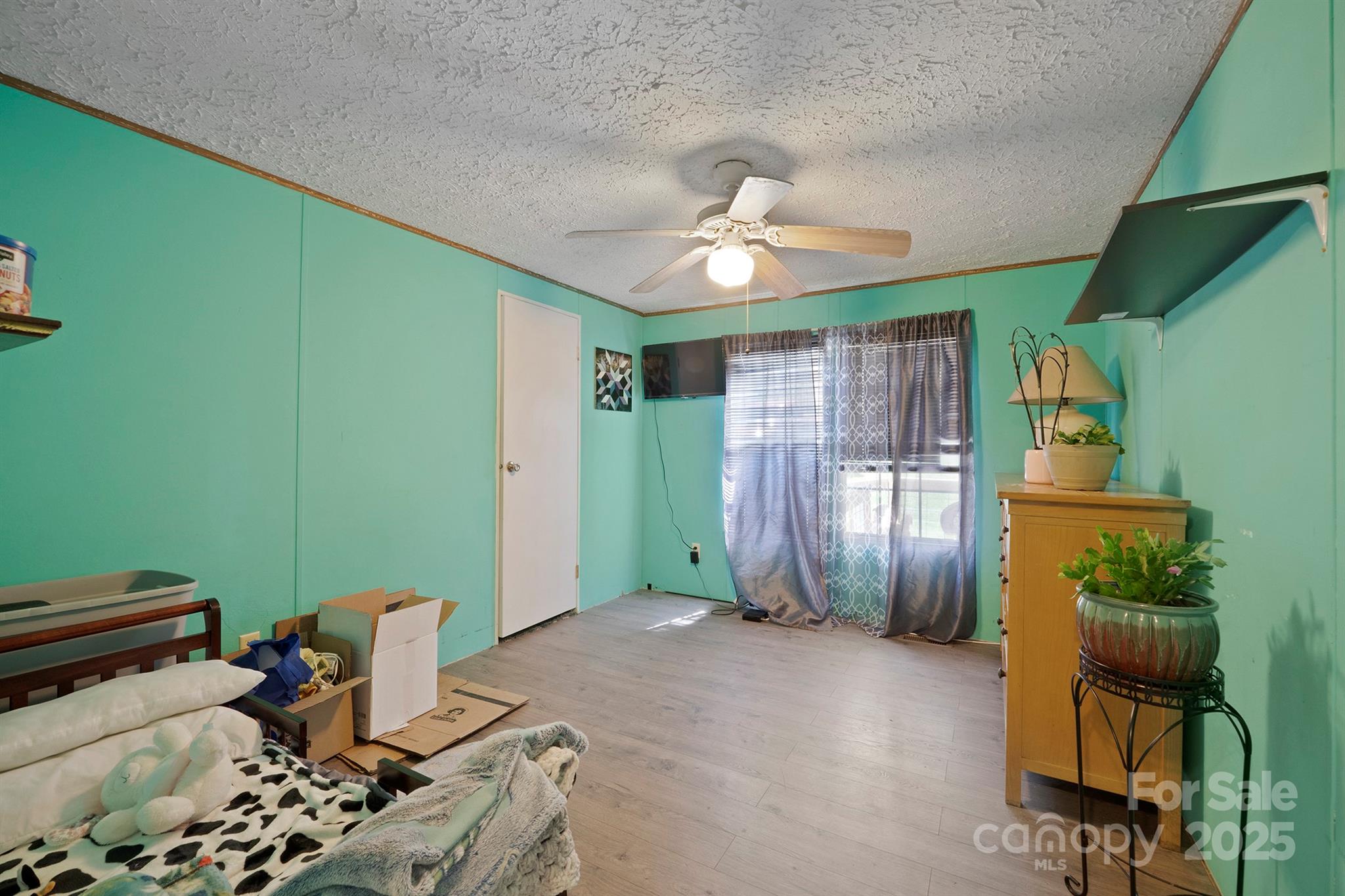 6282 Lor Road Morganton, NC 28655 - Photo 17 of 22 a view of a livingroom with furniture and a window