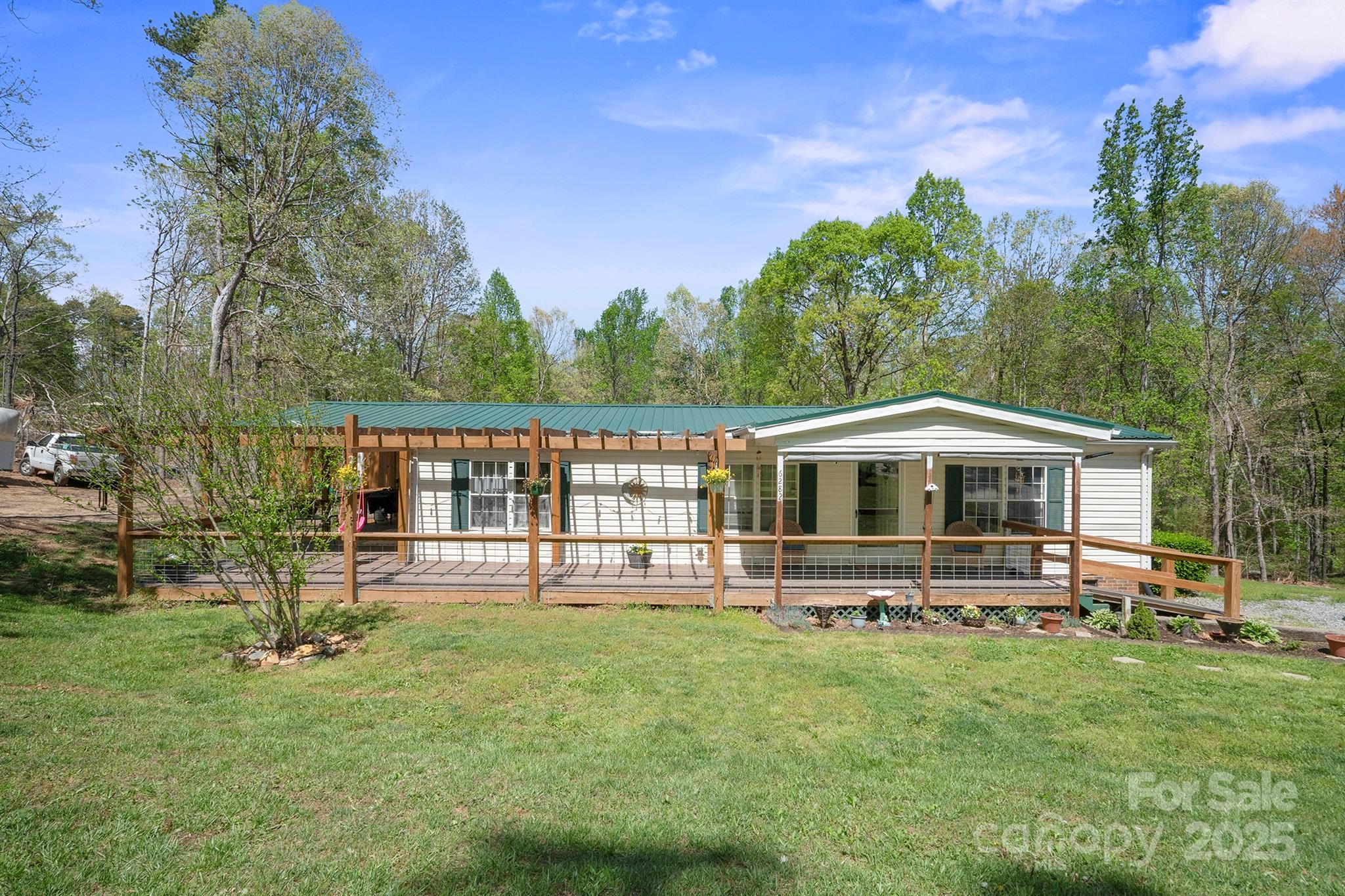 6282 Lor Road Morganton, NC 28655 - Photo 2 of 22 a front view of a house with a yard