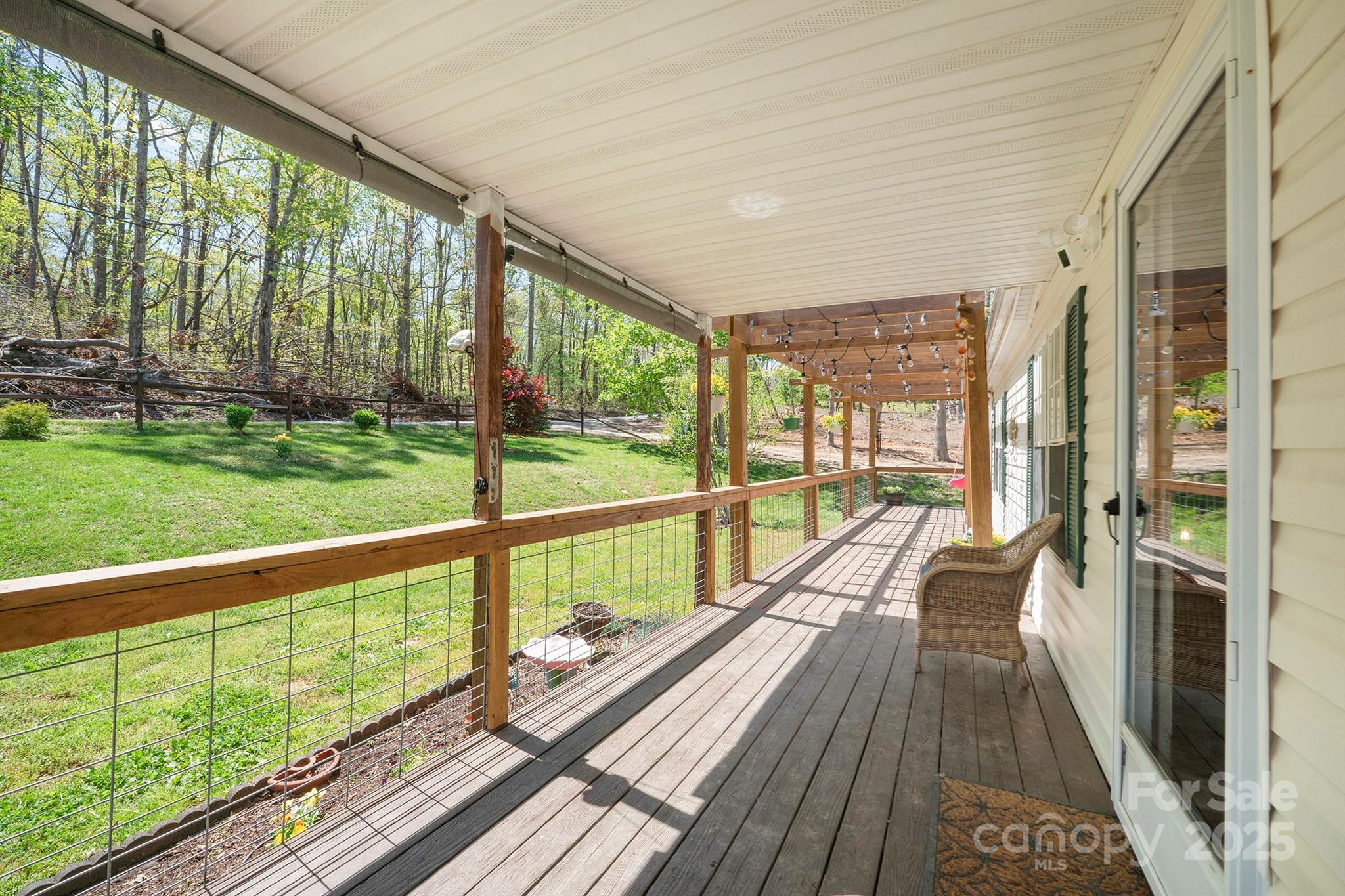 6282 Lor Road Morganton, NC 28655 - Photo 3 of 22 a view of balcony with a large window and wooden floor