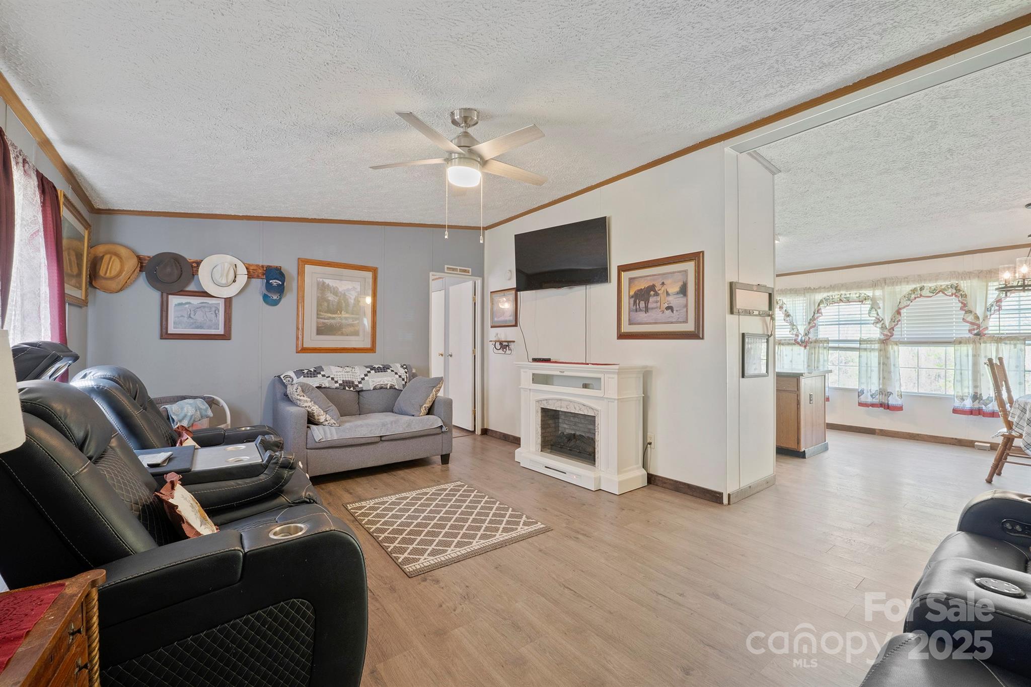 6282 Lor Road Morganton, NC 28655 - Photo 7 of 22 a living room with furniture and a flat screen tv