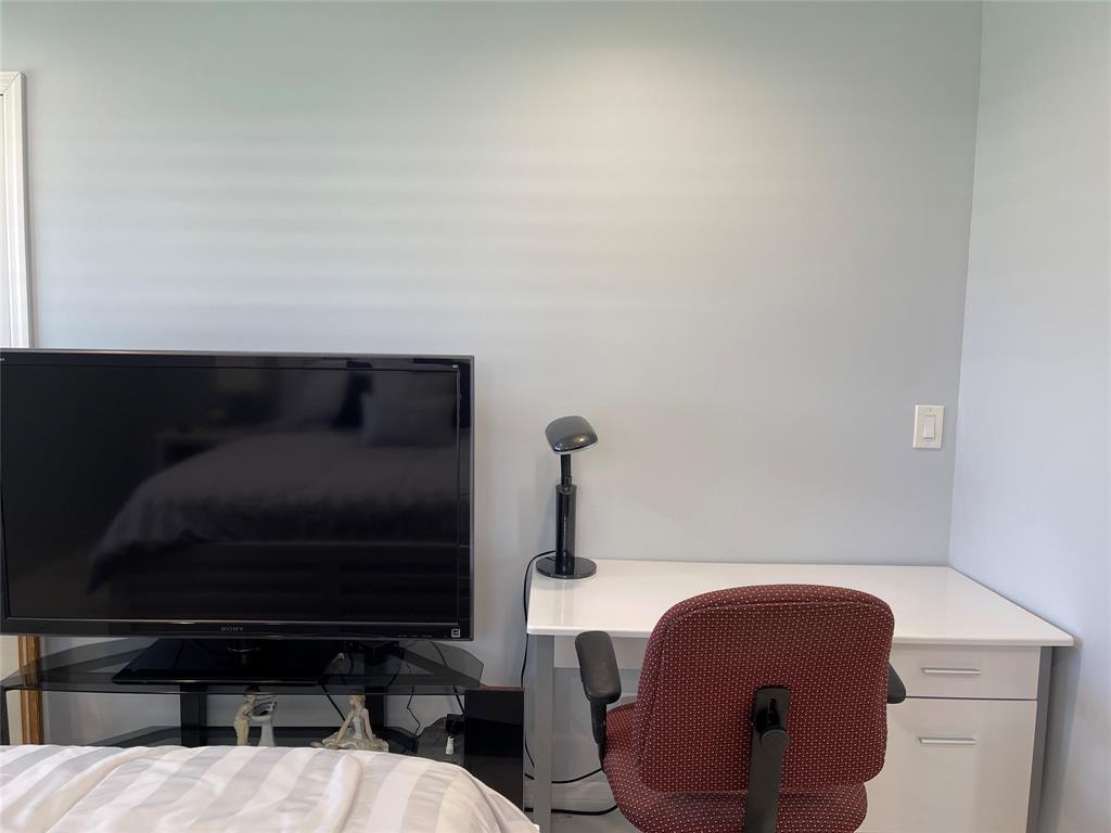 5388 Privet Place, Unit A Delray Beach, FL 33484 - Photo 12 of 33 a living room with furniture and a flat screen tv