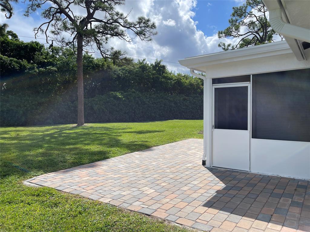 5388 Privet Place, Unit A Delray Beach, FL 33484 - Photo 18 of 33 a view of a porch in front of a house