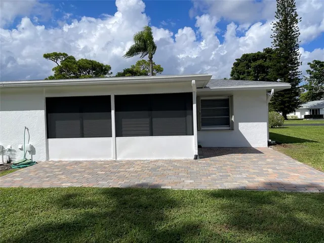 a house view with a garden space