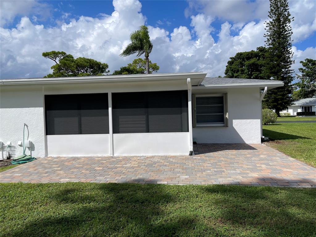 5388 Privet Place, Unit A Delray Beach, FL 33484 - Photo 19 of 33 a house view with a garden space