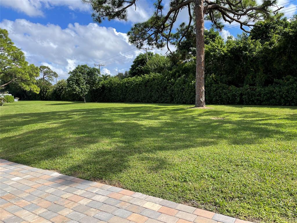 5388 Privet Place, Unit A Delray Beach, FL 33484 - Photo 20 of 33 a big yard with lots of green space