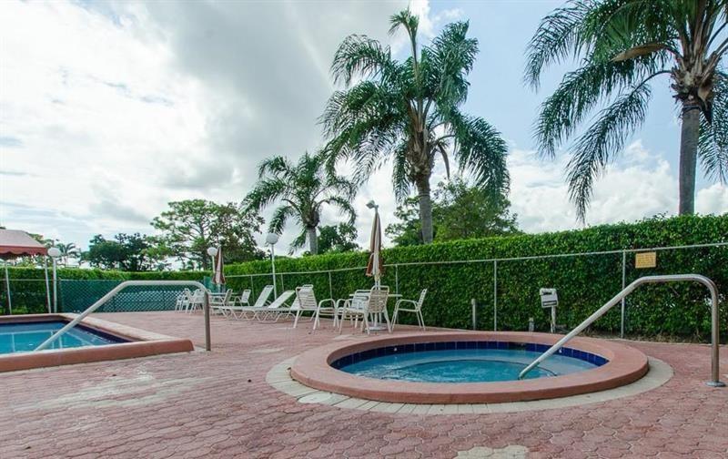 5388 Privet Place, Unit A Delray Beach, FL 33484 - Photo 21 of 33 a view of swimming pool with a patio