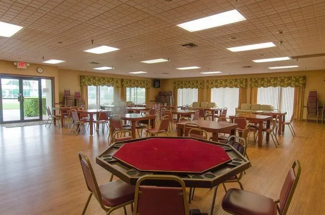 a view of a dining room with furniture