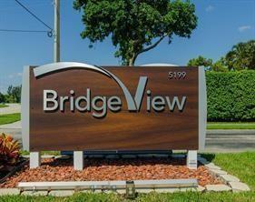 5388 Privet Place, Unit A Delray Beach, FL 33484 - Photo 26 of 33 a sign that is on the side of a building