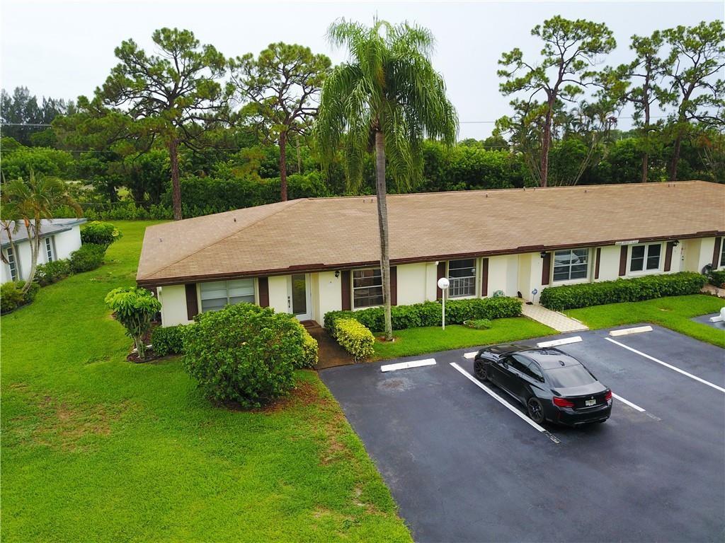 5388 Privet Place, Unit A Delray Beach, FL 33484 - Photo 31 of 33 a view of house with garden