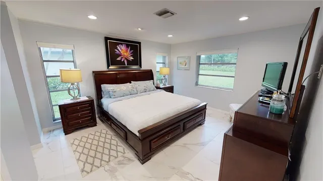 a bedroom with a bed and furniture