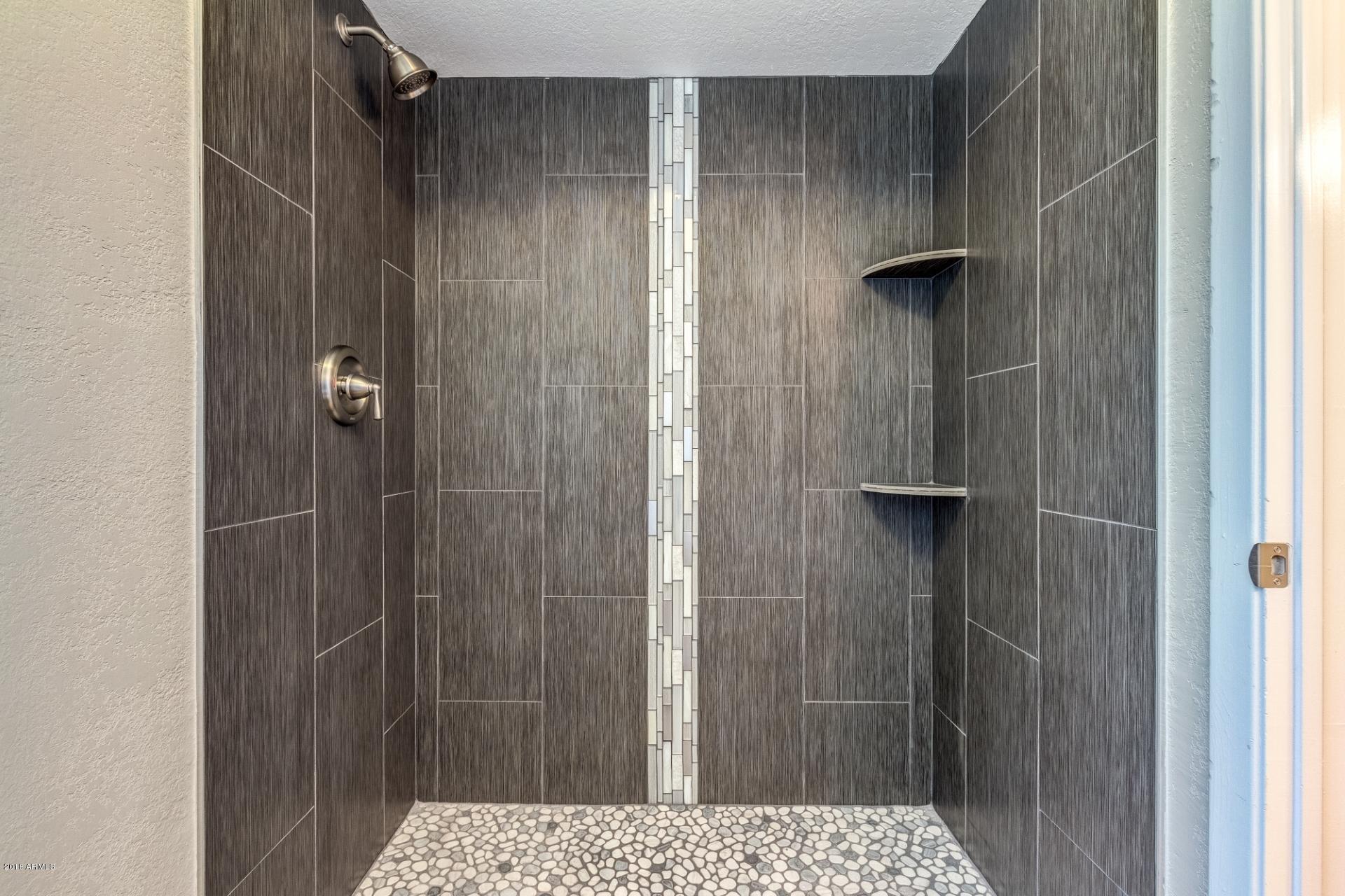 4833 East Kathleen Road Scottsdale, AZ 85254 - Photo 18 of 21 a bathroom with a shower