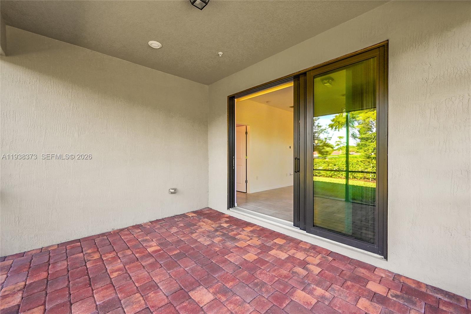 9145 Passiflora Way Boca Raton, FL 33428 - Photo 27 of 54 a view of an empty room and window
