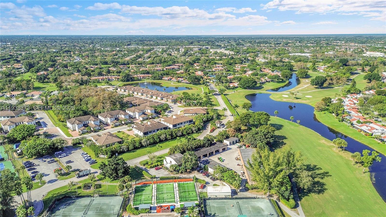 9145 Passiflora Way Boca Raton, FL 33428 - Photo 41 of 54 an aerial view of residential building with outdoor space and trees