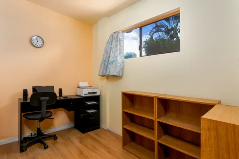 a view of a workspace with furniture