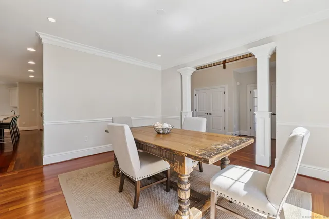 a view of a couches in the patio next to a yard