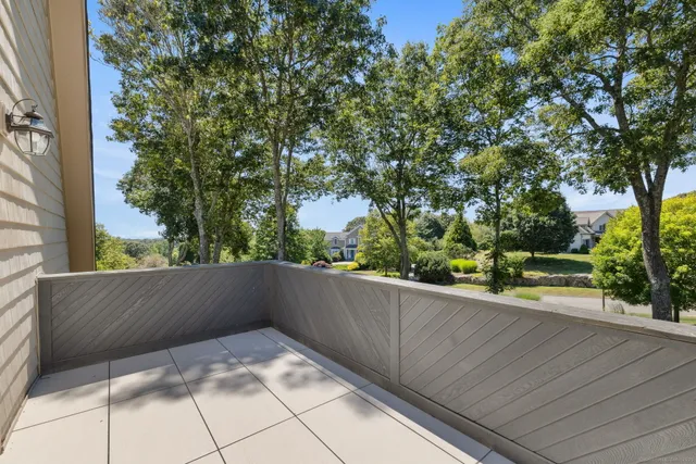 a kitchen with stainless steel appliances a refrigerator stove and microwave