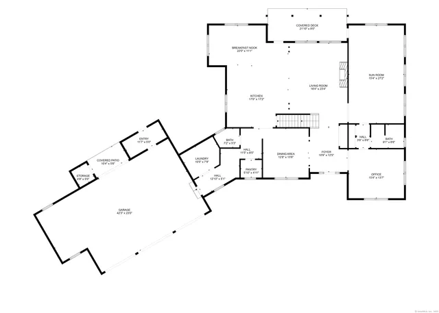 a picture of a bench in front of a gate