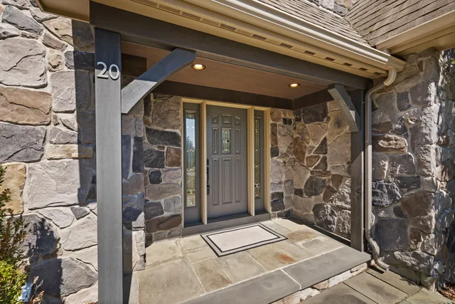 a view of a livingroom with furniture and hardwood floor