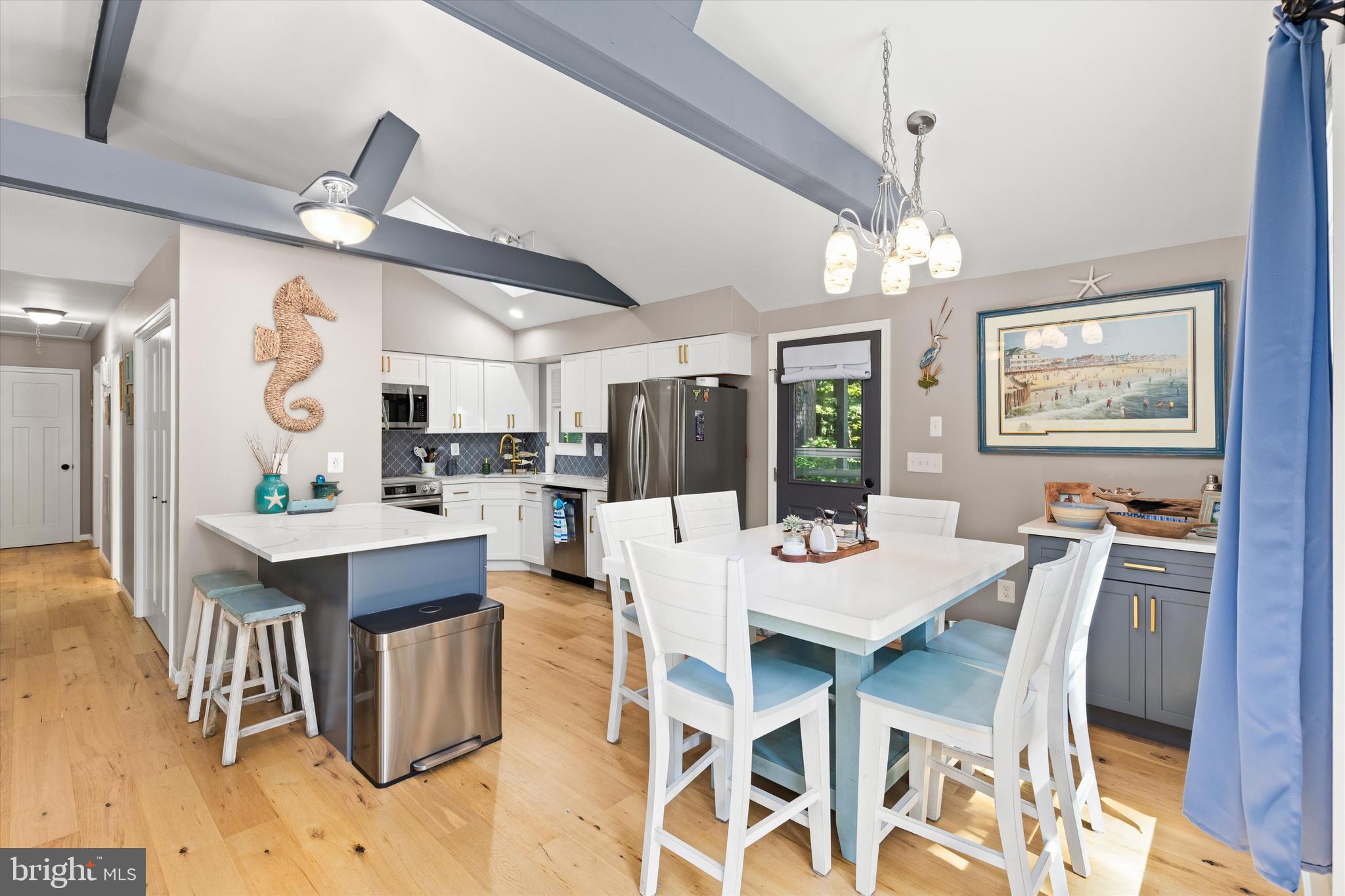 4 Haven End Ocean Pines, MD 21811 - Photo 11 of 37 a view of a dining room with furniture window and wooden floor