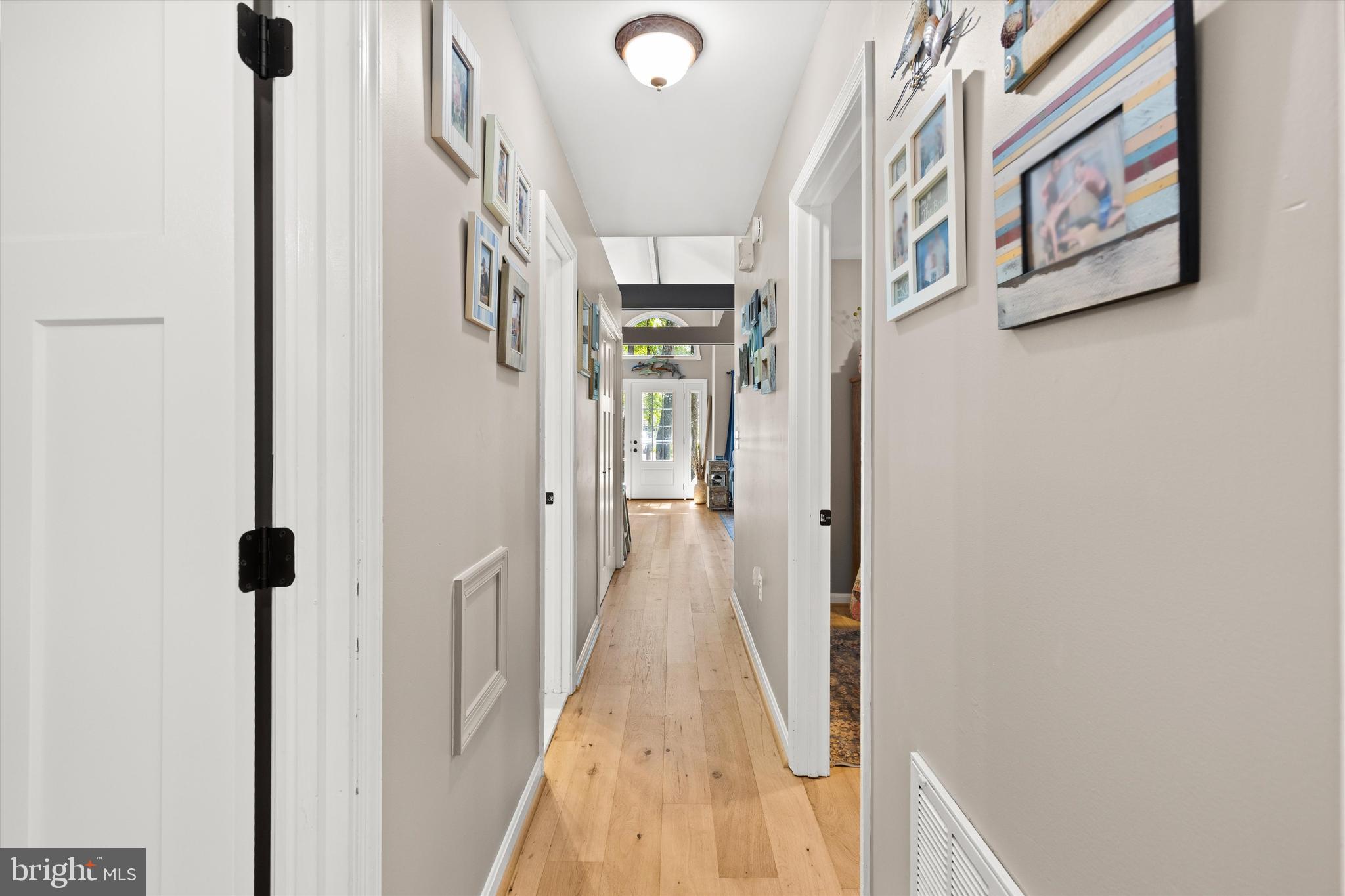 4 Haven End Ocean Pines, MD 21811 - Photo 14 of 37 a view of a hallway with wooden floor
