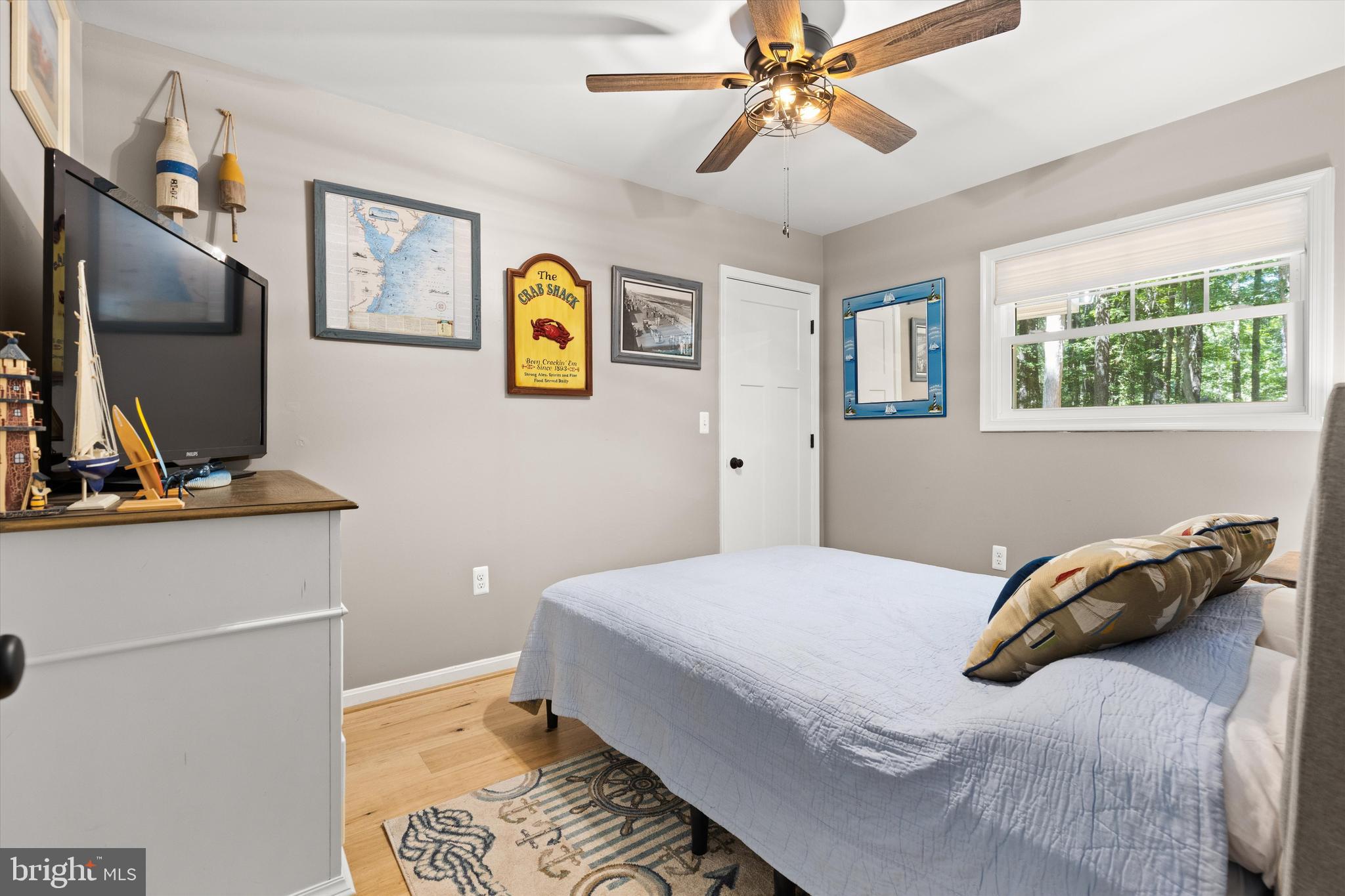 4 Haven End Ocean Pines, MD 21811 - Photo 21 of 37 a bedroom with a bed and a flat screen tv