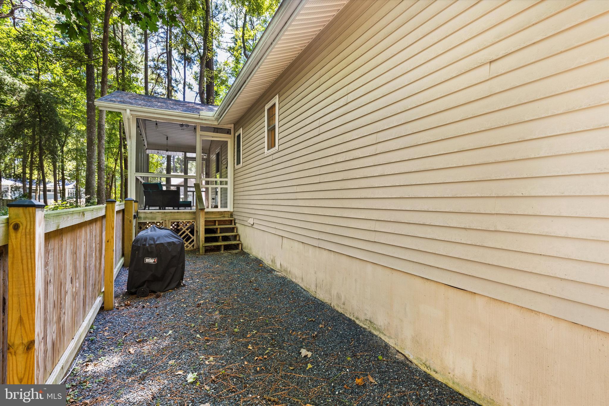 4 Haven End Ocean Pines, MD 21811 - Photo 30 of 37 a view of a chair and tables in the balcony