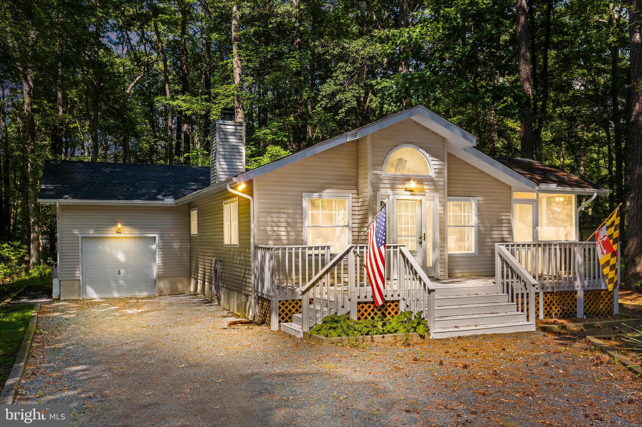 4 Haven End Ocean Pines, MD 21811 - Photo 36 of 37 a view of a house with a patio and a yard