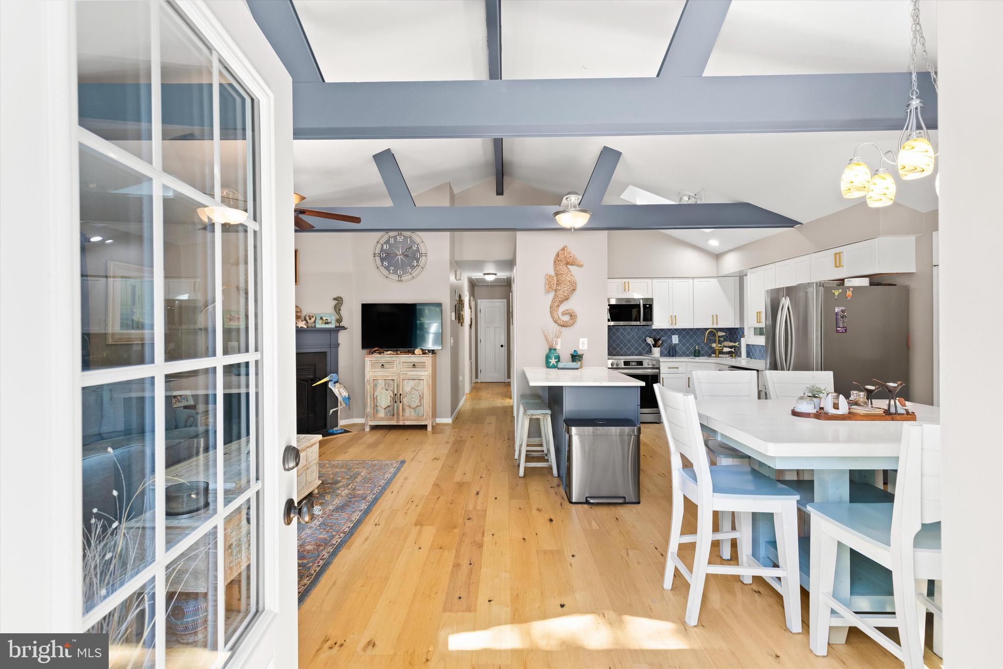 4 Haven End Ocean Pines, MD 21811 - Photo 5 of 37 a large white kitchen with a large window