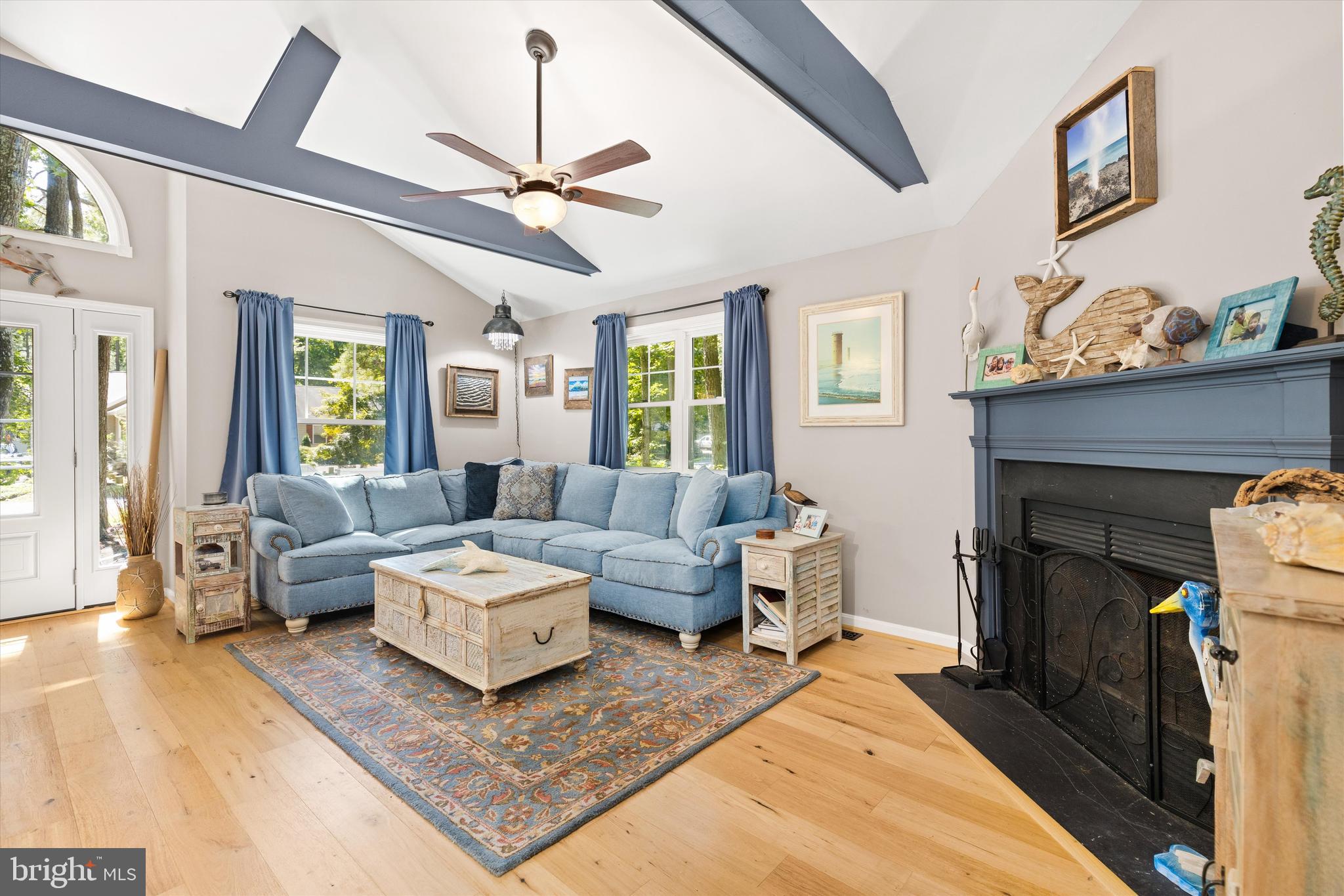 4 Haven End Ocean Pines, MD 21811 - Photo 8 of 37 a living room with furniture and a fireplace