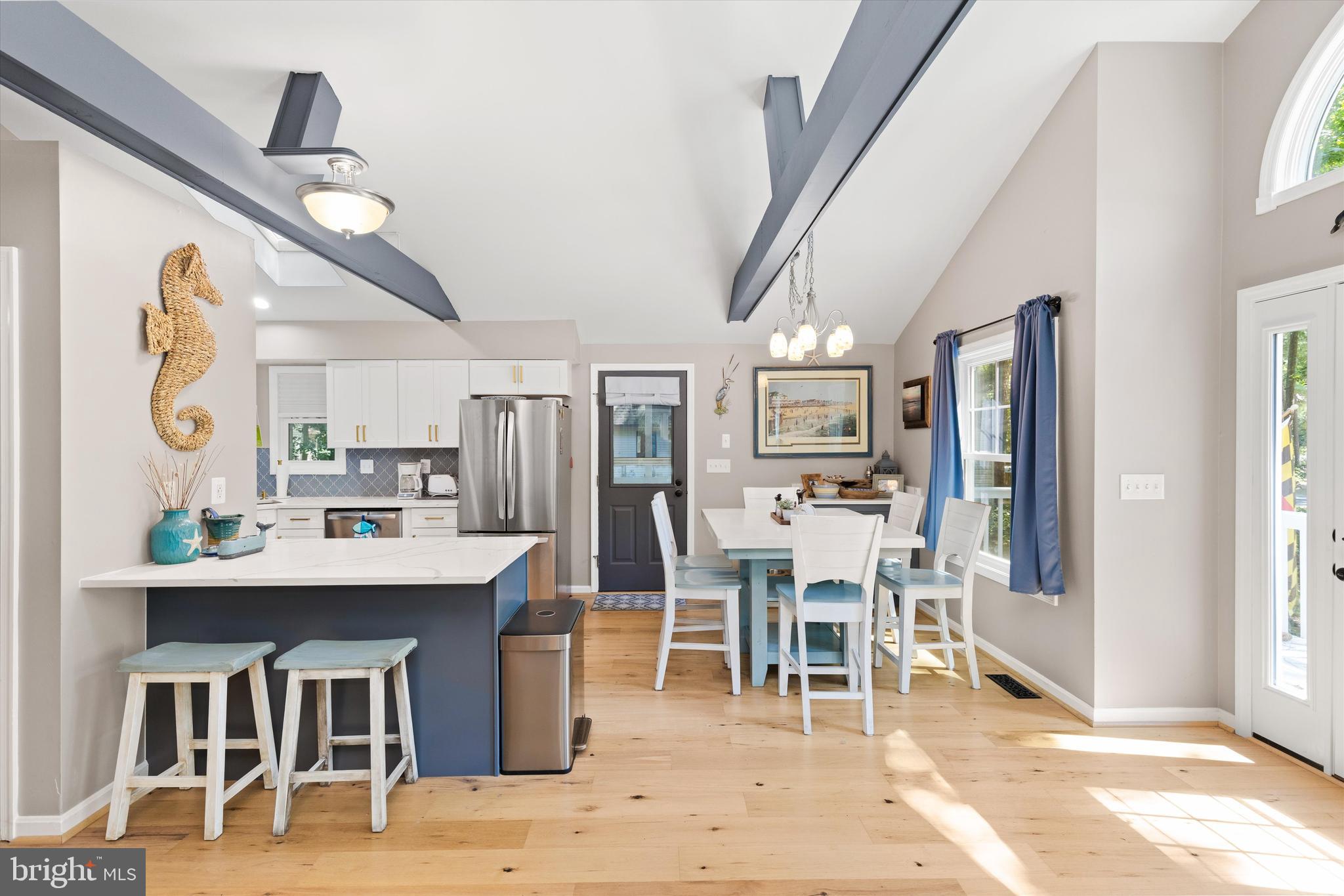 4 Haven End Ocean Pines, MD 21811 - Photo 10 of 37 a dining room with furniture and chandelier