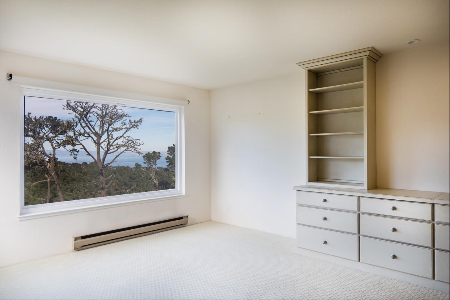 27 Shepherds Knoll Road, Unit 27 Monterey, CA 93940 - Photo 8 of 11 a view of an empty room and window