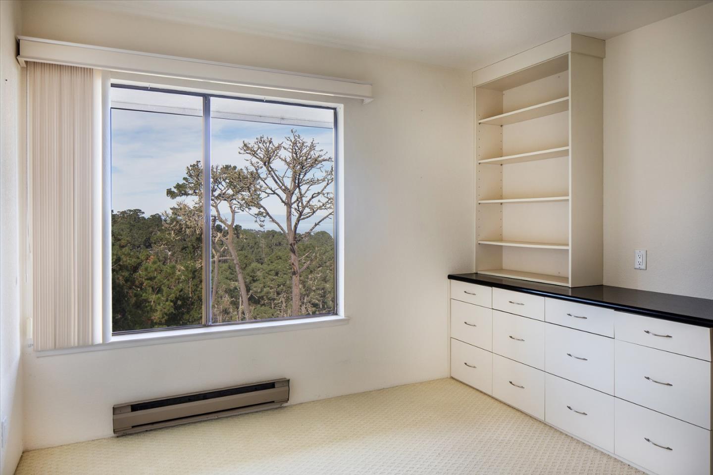 27 Shepherds Knoll Road, Unit 27 Monterey, CA 93940 - Photo 10 of 11 a view of an empty room with a window