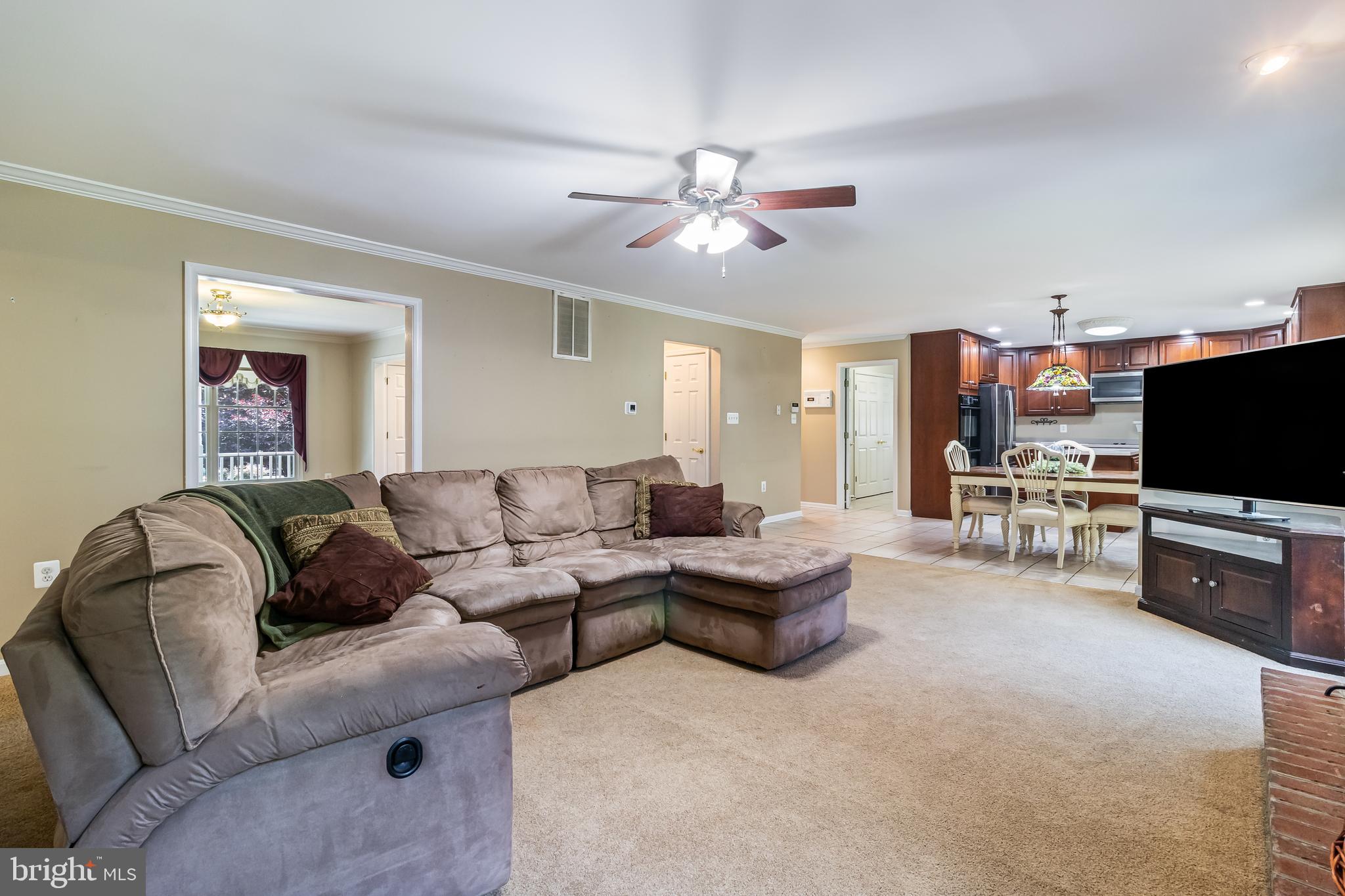 203 Morgans Ridge Court La Plata, MD 20646 - Photo 26 of 59 a living room with furniture and a flat screen tv